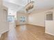 Open concept living area with natural light and modern light fixtures at 10257 Dovehill Ln, Clermont, FL 34711