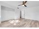 Bedroom with closet and ceiling fan at 1051 S Highland St # 4B, Mount Dora, FL 32757