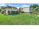 A well-maintained condominium complex with manicured lawns and mature landscaping, offering a welcoming curb appeal at 1051 S Highland St # 4B, Mount Dora, FL 32757