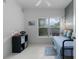 Cozy bedroom with plenty of natural light and a clean, modern design at 11497 Sw 82Nd Court Rd, Ocala, FL 34481