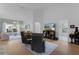 Bright living room with high ceilings, an open layout, and a seamless flow to other living areas at 11497 Sw 82Nd Court Rd, Ocala, FL 34481