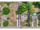 Aerial shot of property with a screened-in pool and spacious backyard at 11763 Oswalt Rd, Clermont, FL 34711