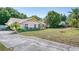 Single story home with well maintained landscaping and a comfortable layout at 11763 Oswalt Rd, Clermont, FL 34711