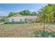 Welcoming home with a charming front yard and inviting curb appeal at 11763 Oswalt Rd, Clermont, FL 34711