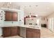 Modern kitchen featuring granite countertops, stainless steel appliances, and ample cabinetry at 11763 Oswalt Rd, Clermont, FL 34711