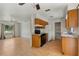 Open-concept space connecting the kitchen to living area, with access to the back yard at 11987 Se 95Th Ter, Belleview, FL 34420