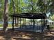 Covered picnic area provides shade and seating for outdoor gatherings and community events at 121 Maple Dr, Debary, FL 32713