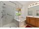 Bathroom featuring neutral counters, soaking tub, large glass shower and ample natural light at 12511 Se 91St Terrace Rd, Summerfield, FL 34491