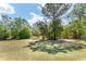 Nature path with lush greenery, towering trees, and shady spots for relaxing walks at 12511 Se 91St Terrace Rd, Summerfield, FL 34491