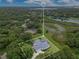 Drone shot featuring a home, pond, and surrounding property lines at 13112 Luntz Point Ln, Windermere, FL 34786