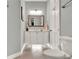 Bathroom featuring vanity, modern fixtures, and tile floors at 13112 Luntz Point Ln, Windermere, FL 34786