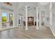 Open-concept dining room with high ceilings and views of the backyard pool at 13112 Luntz Point Ln, Windermere, FL 34786