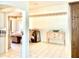 Spacious living area with tile flooring, neutral colors, and an open layout at 1312 Corona Ave, The Villages, FL 32159