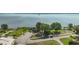 Aerial view of a park with lake views and a gazebo at 137 E Palmetto Ave, Howey In The Hills, FL 34737