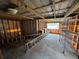 Spacious unfinished basement offering potential for customization with a window for natural light at 1425 Douglas Rd, Groveland, FL 34736