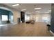 Spacious clubhouse featuring an open floorplan, fireplace, cozy seating, and ample lighting for gatherings and activities at 146 Essex Pl, Davenport, FL 33896