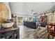 Comfortable living room with stylish decor, wood floors, and plenty of natural light at 179 Patrice Hope St, Leesburg, FL 34748
