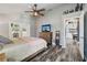 Main bedroom with hardwood floors and neutral colors at 179 Patrice Hope St, Leesburg, FL 34748