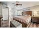 Comfortable main bedroom with natural light at 179 Patrice Hope St, Leesburg, FL 34748