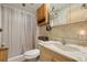 A bathroom featuring a shower, cabinet storage, and vanity at 1901 Brookside Dr, Mount Dora, FL 32757