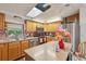 Well-lit kitchen with stainless steel appliances and center island at 1901 Brookside Dr, Mount Dora, FL 32757