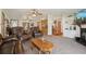 Spacious living room with plush carpeting and an inviting open layout at 1901 Brookside Dr, Mount Dora, FL 32757