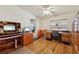 Office area with desk, computer, and wood flooring at 1901 Brookside Dr, Mount Dora, FL 32757