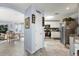 Open floor plan showcasing kitchen with pantry, breakfast nook, and dining area at 1917 Peachtree Ave, The Villages, FL 32162