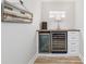 Dry bar area with cooler and wine fridge, perfect for entertaining at 1992 Hagood Loop, The Villages, FL 32162