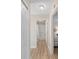 Hallway showcasing access to a bathroom and bedroom at 1992 Hagood Loop, The Villages, FL 32162