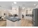 Open kitchen design with a breakfast bar, perfect for casual dining and entertaining at 1992 Hagood Loop, The Villages, FL 32162