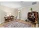 Elegant living room featuring light-colored wood floors and stylish furnishings at 1992 Hagood Loop, The Villages, FL 32162