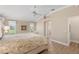 Bright main bedroom with ensuite access and an abundance of natural light at 1992 Hagood Loop, The Villages, FL 32162