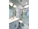 Modern bathroom with glass shower, sleek vanity, and neutral tile flooring at 2261 Osprey Ave, Orlando, FL 32814