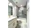 Modern bathroom with gray tiled shower and vanity at 2261 Osprey Ave, Orlando, FL 32814