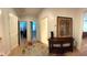 Hallway with hardwood floors, accent table, and views of the bedroom and bathroom at 2261 Osprey Ave, Orlando, FL 32814