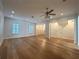 Spacious living room with hardwood floors, recessed lighting, and plantation shutters at 2261 Osprey Ave, Orlando, FL 32814