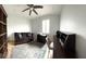 Spacious office featuring a ceiling fan, shutters, hardwood floors, desk, and sofa at 2261 Osprey Ave, Orlando, FL 32814