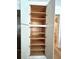 Spacious pantry cabinet with wooden shelves at 2261 Osprey Ave, Orlando, FL 32814