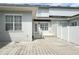Outdoor patio area featuring a paver patio and white privacy fence at 2261 Osprey Ave, Orlando, FL 32814