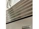 Close up of stainless steel refrigerator featuring a Sub Zero logo, modern design, and sleek handle at 2261 Osprey Ave, Orlando, FL 32814