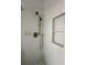 Close up of modern shower design with a rainfall shower head and built-in niche at 2261 Osprey Ave, Orlando, FL 32814