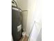 This water heater is in a closet with shelving at 2261 Osprey Ave, Orlando, FL 32814