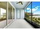 A covered screened lanai with great views of the water at 251 Blue Cypress Dr, Groveland, FL 34736