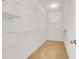 Spacious walk-in closet with wire shelving, providing ample storage at 251 Blue Cypress Dr, Groveland, FL 34736