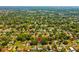 Neighborhood aerial showing location of tree-covered home in a residential area at 2517 Royal Palm Dr, Edgewater, FL 32141