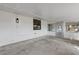 Spacious covered patio with updated lighting fixtures at 2517 Royal Palm Dr, Edgewater, FL 32141