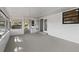 Bright and airy sunroom with backyard access at 2517 Royal Palm Dr, Edgewater, FL 32141