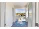 Charming balcony with patterned tile flooring offering a view of the neighborhood at 25962 High Hampton Cir, Sorrento, FL 32776
