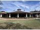 Stunning clubhouse with manicured landscaping and plenty of covered outdoor space to enjoy the view at 25962 High Hampton Cir, Sorrento, FL 32776